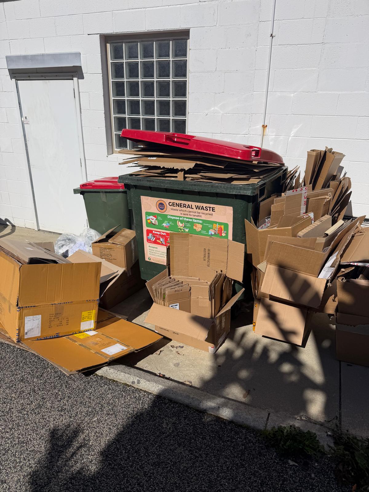 Commercial cardboard packaging waste and general waste bins cleanout