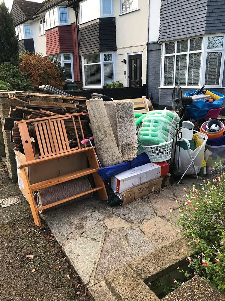 House cleanout waste pile ready for rubbish removal in Perth